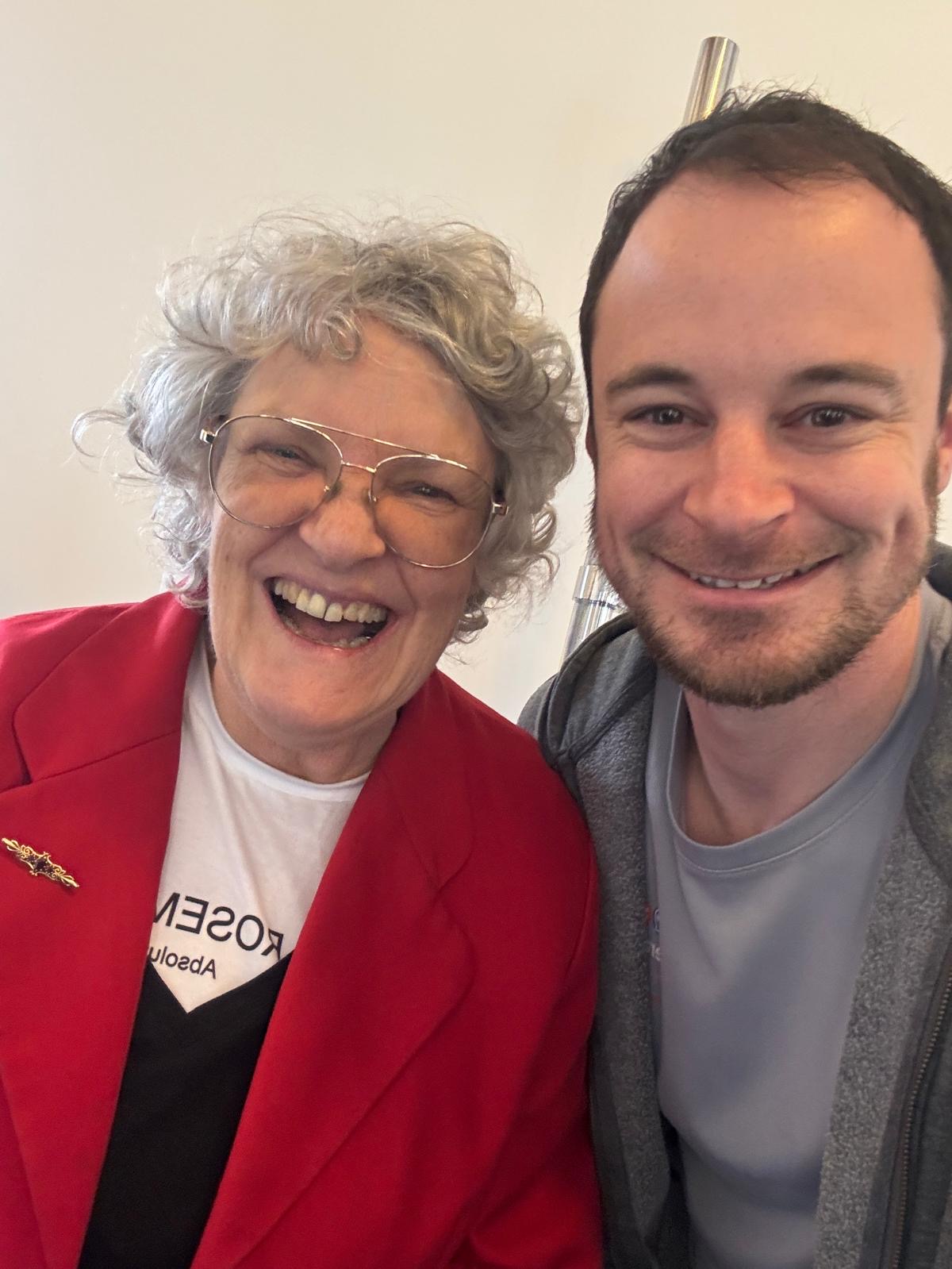 Rosemary K. with Matt Brinkley in the Therapy Gym, showing the personalized support and friendly environment for members